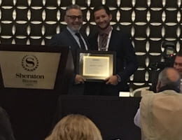 Mr. Brad Uding receives the Student Excellence Award