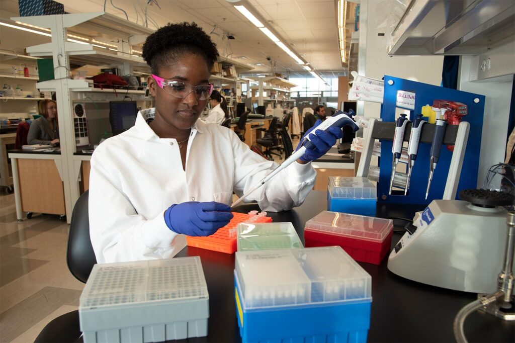 summer research fellowship student working in lab