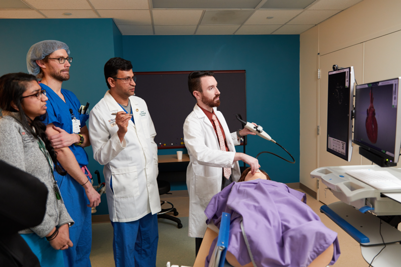 Dr. Lak teaching residents in the anesthesiology simulation center.